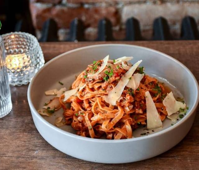 Tagliatelle All'Amatriciana (Tagliatelle with Pancetta and Tomato Sauce).