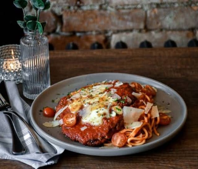 Chicken Parmigiana (Breaded Chicken with Tomato Sauce and Mozzarella).